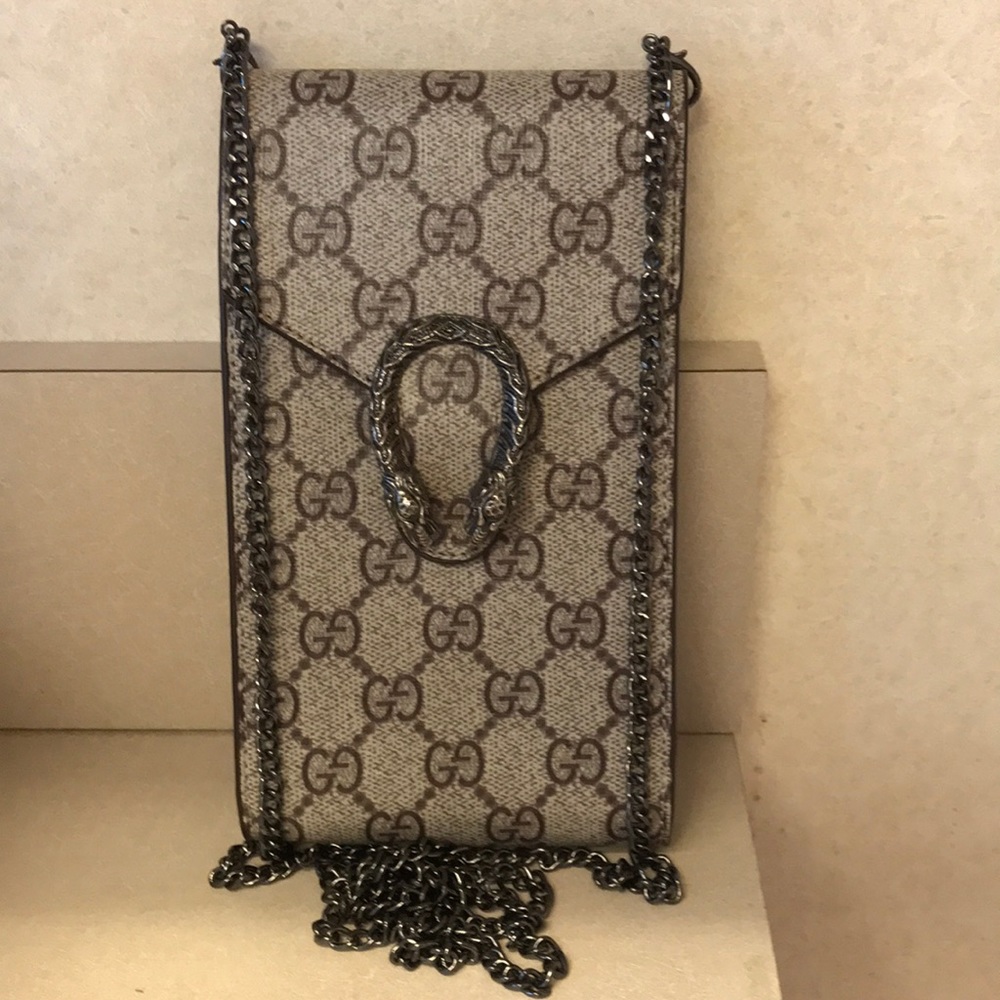 Crossbody bag. New- holds 3 credit cards, cash, lipstick and phone.